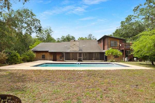 9.48 Acres of Land with Home for Sale in Micanopy, Florida