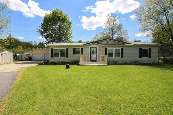2 Acres of Land with Home for Sale in Jones, Michigan