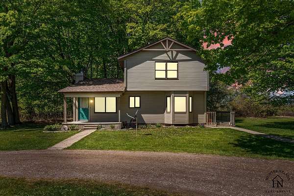 4 Acres of Land with Home for Sale in Sparta, Michigan