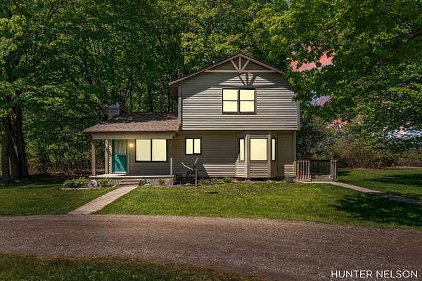 4 Acres of Land with Home for Sale in Sparta, Michigan