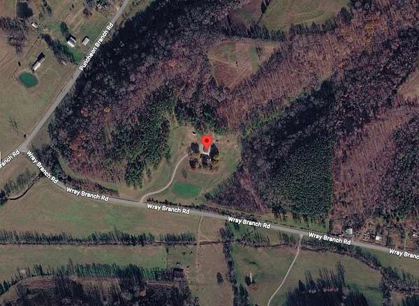 61 Acres of Land with Home for Auction in Minor Hill, Tennessee
