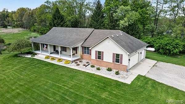 2 Acres of Land with Home for Sale in Oceola Township, Michigan