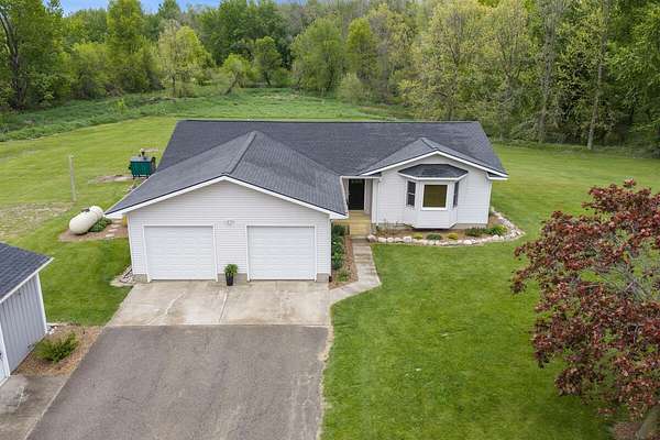 5.13 Acres of Land with Home for Sale in Hopkins, Michigan