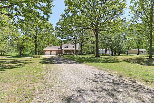 8.59 Acres of Land with Home for Sale in Fordland, Missouri