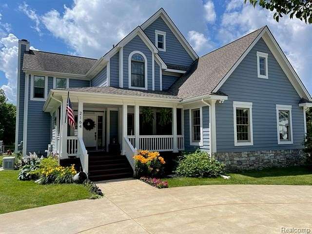 2 Acres of Land with Home for Sale in Oceola Township, Michigan