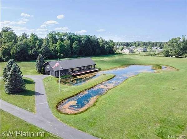 9.64 Acres of Improved Mixed-Use Land for Sale in Clyde Township, Michigan