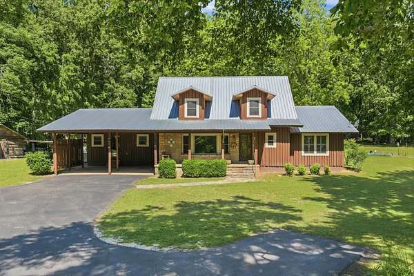6.85 Acres of Land with Home for Sale in Decaturville, Tennessee