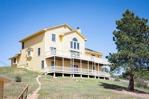 18.5 Acres of Land with Home for Sale in Indian Hills, Colorado