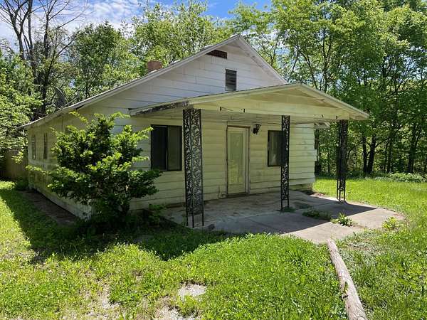 10.5 Acres of Recreational Land with Home for Sale in Springfield, Missouri