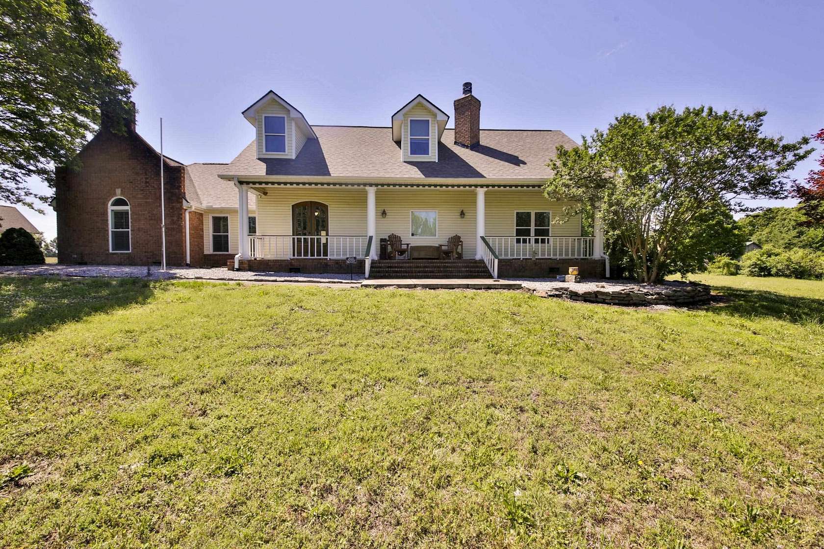 8.32 Acres of Land with Home for Sale in Drummonds, Tennessee