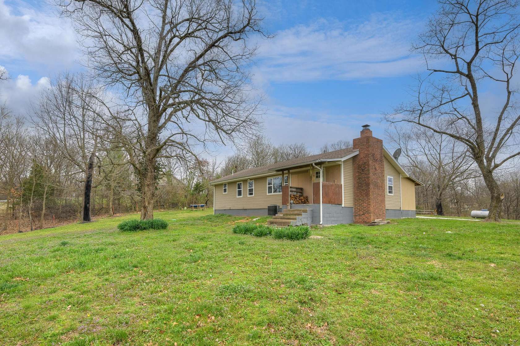 5.7 Acres of Land with Home for Sale in Neosho, Missouri
