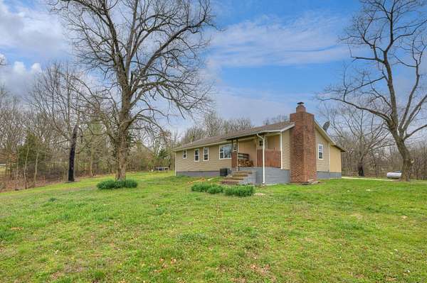 5.7 Acres of Land with Home for Sale in Neosho, Missouri