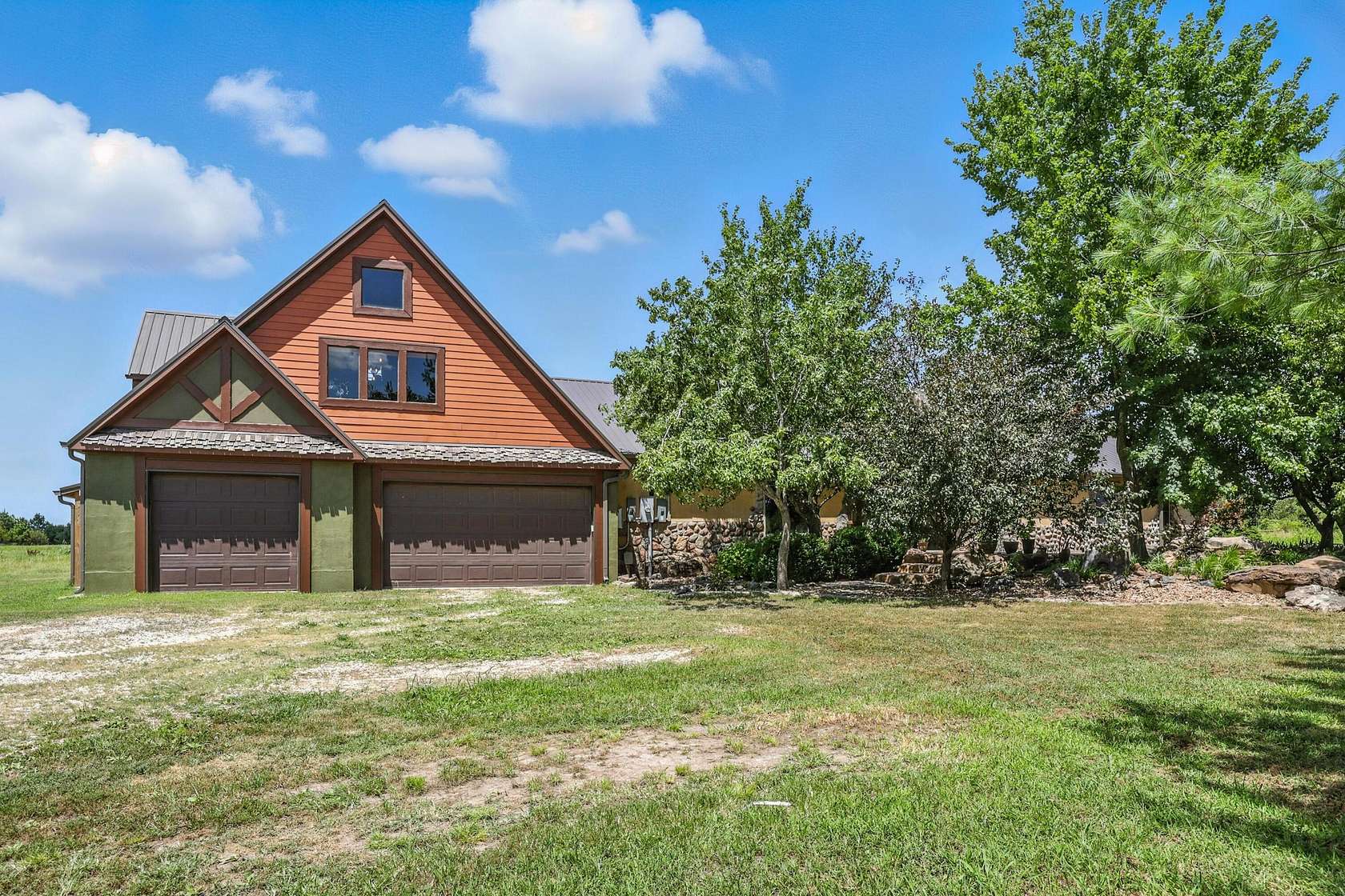 9.9 Acres of Land with Home for Sale in Diamond, Missouri