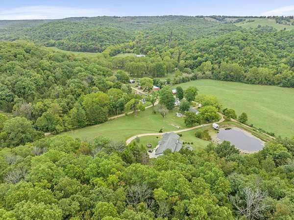 919 Acres of Recreational Land with Home for Sale in Sparta, Missouri