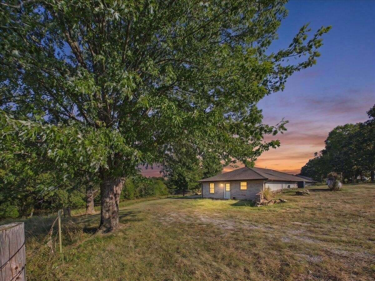 40 Acres of Land with Home for Sale in Macks Creek, Missouri