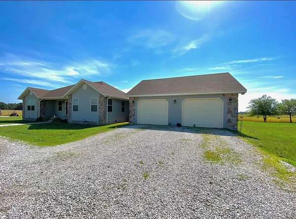 37.7 Acres of Agricultural Land with Home for Sale in Stark City, Missouri