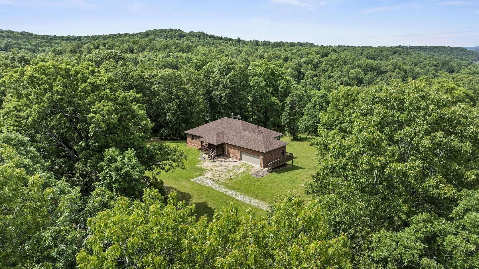 275 Acres of Recreational Land with Home for Sale in Theodosia, Missouri