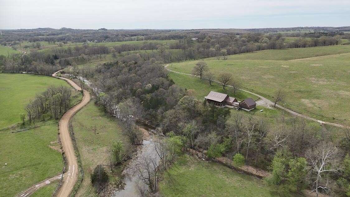 148 Acres of Land with Home for Sale in Bakersfield, Missouri