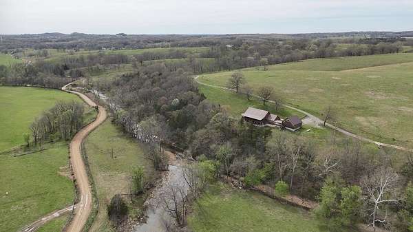 148 Acres of Land with Home for Sale in Bakersfield, Missouri
