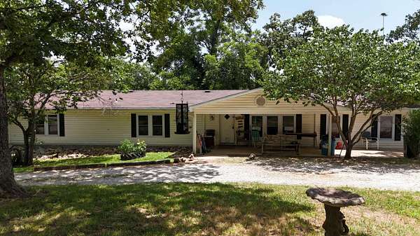 5.8 Acres of Land with Home for Sale in Eagle Rock, Missouri