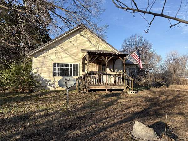 22.7 Acres of Land with Home for Sale in Greenfield, Missouri