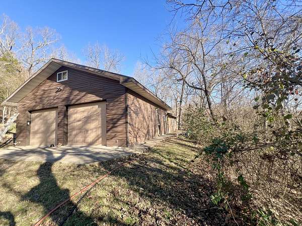 13.6 Acres of Land with Home for Sale in Theodosia, Missouri