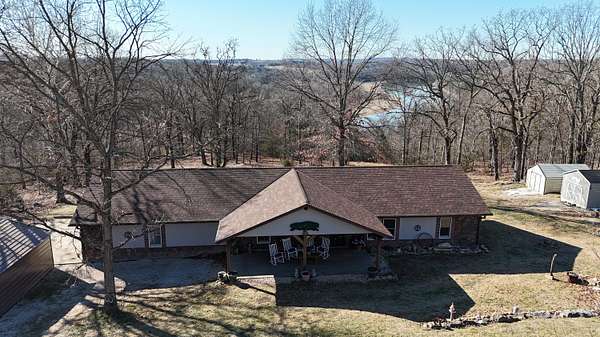 8.4 Acres of Land with Home for Sale in Shell Knob, Missouri
