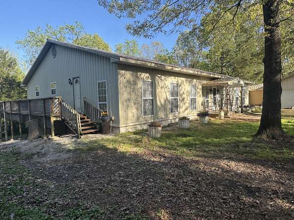 10 Acres of Land with Home for Sale in Exeter, Missouri