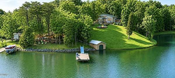 4.77 Acres of Land with Home for Sale in Dandridge, Tennessee
