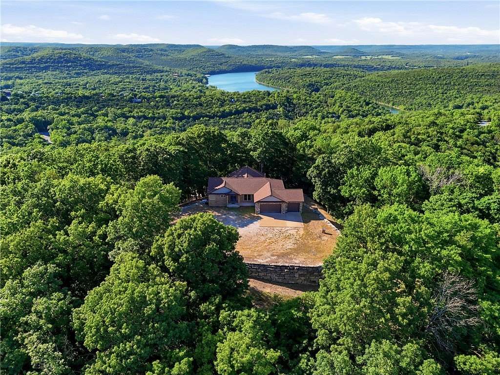 5 Acres of Land with Home for Sale in Holiday Island, Arkansas