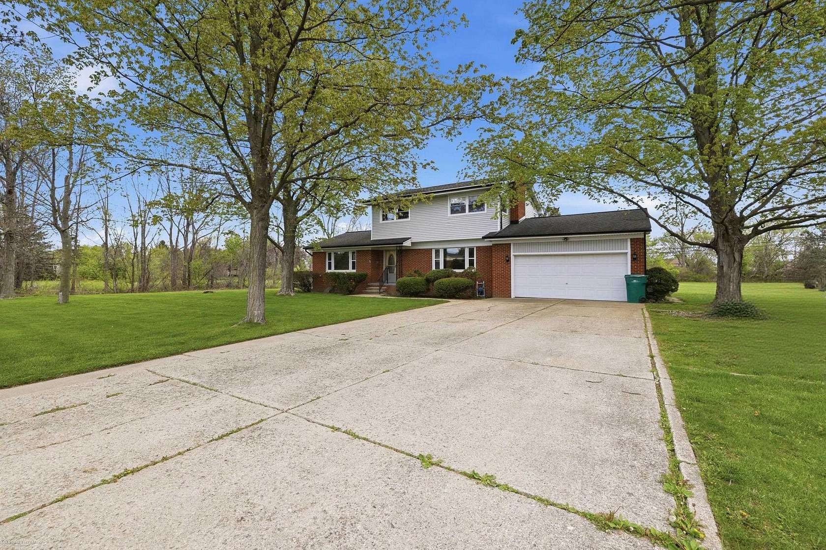 1.72 Acres of Land with Home for Sale in Macomb, Michigan