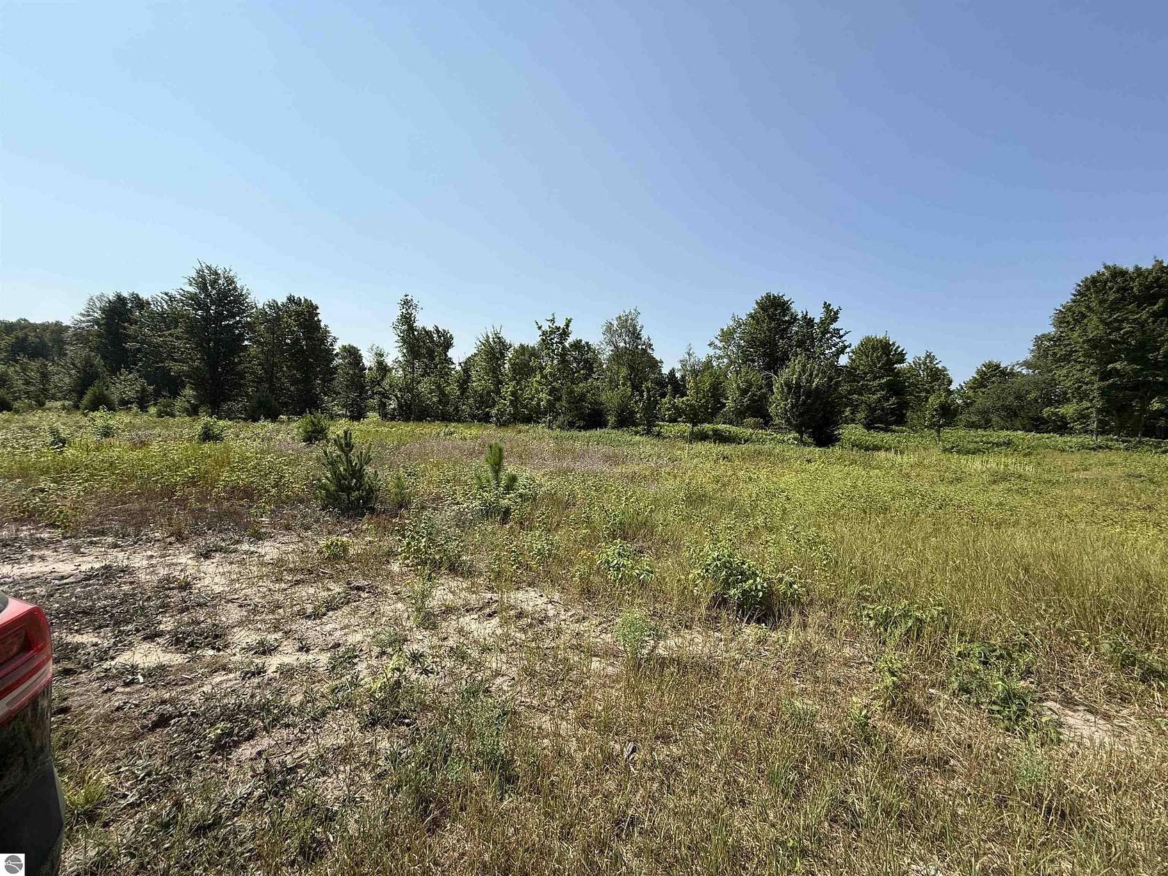 5 Acres of Residential Land for Sale in Maple City, Michigan
