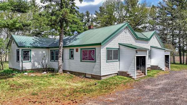 4 Acres of Improved Mixed-Use Land for Sale in Gilman, Wisconsin