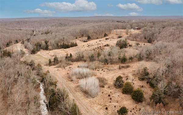 40 Acres of Recreational Land with Home for Sale in Versailles, Missouri