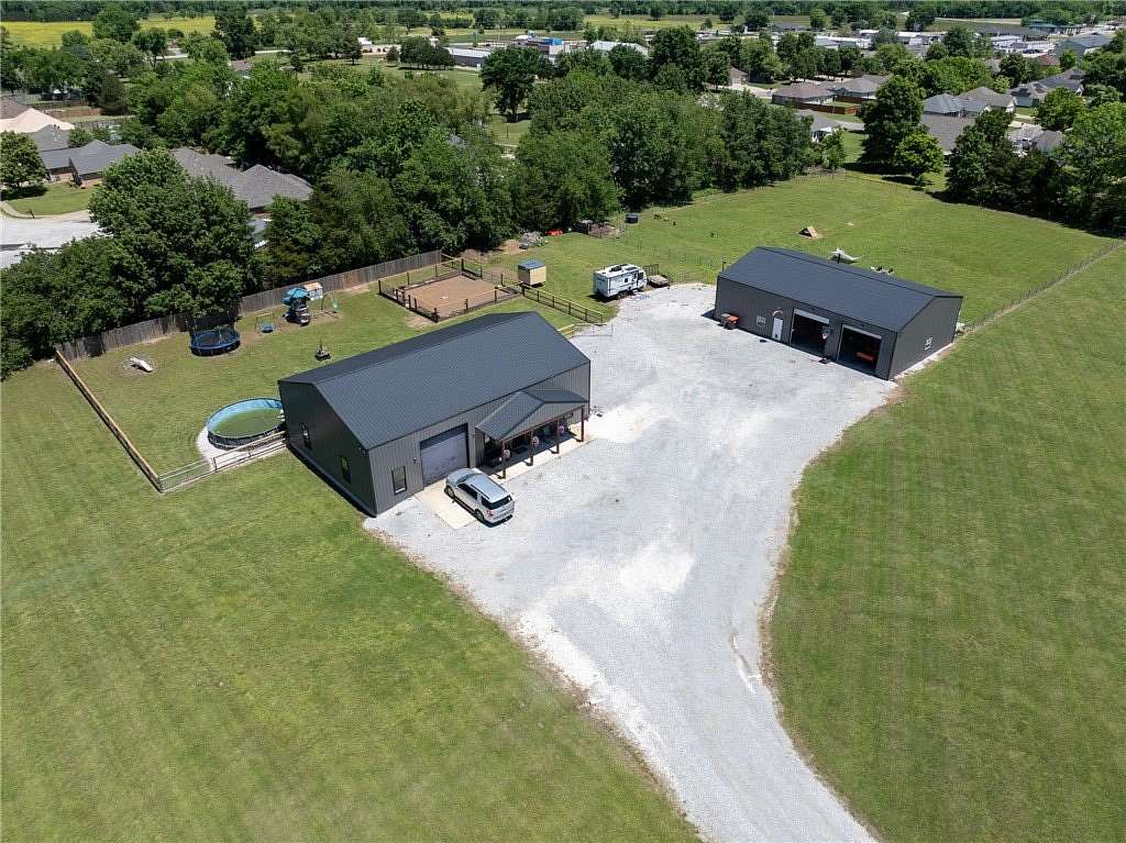 6.1 Acres of Land with Home for Sale in Elkins, Arkansas