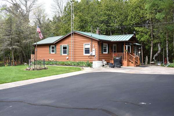 3.1 Acres of Land with Home for Sale in Chase, Michigan