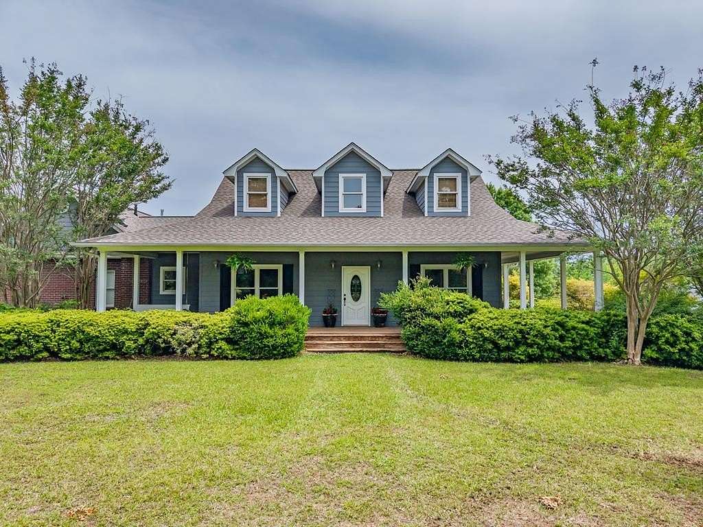 35 Acres of Land with Home for Sale in Enid, Mississippi