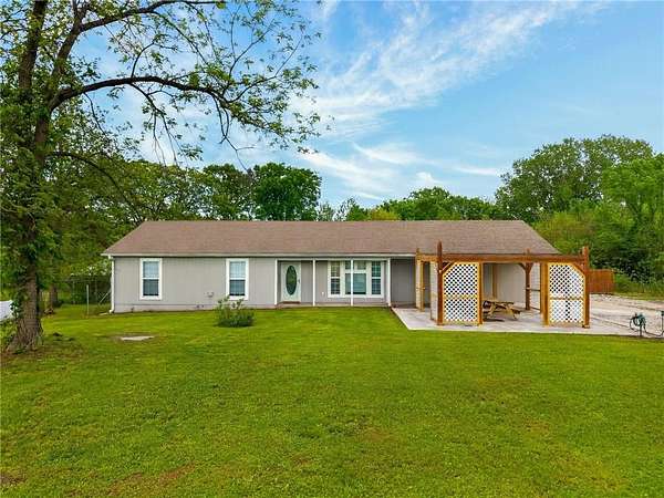 4.5 Acres of Land with Home for Sale in Kingsville, Missouri