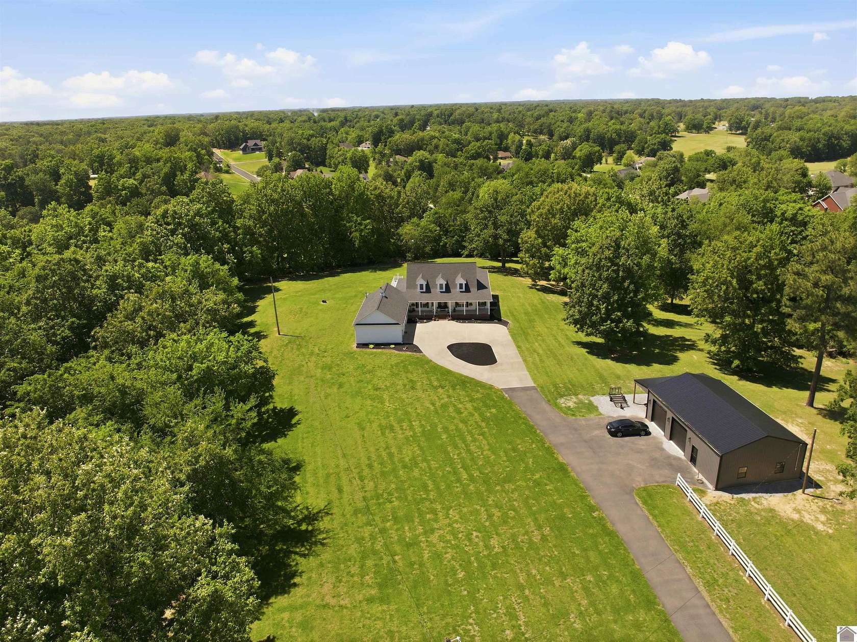 6.59 Acres of Land with Home for Sale in Benton, Kentucky