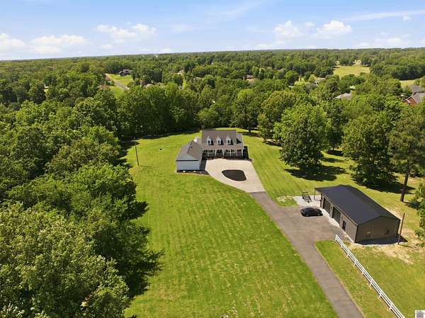 6.59 Acres of Land with Home for Sale in Benton, Kentucky