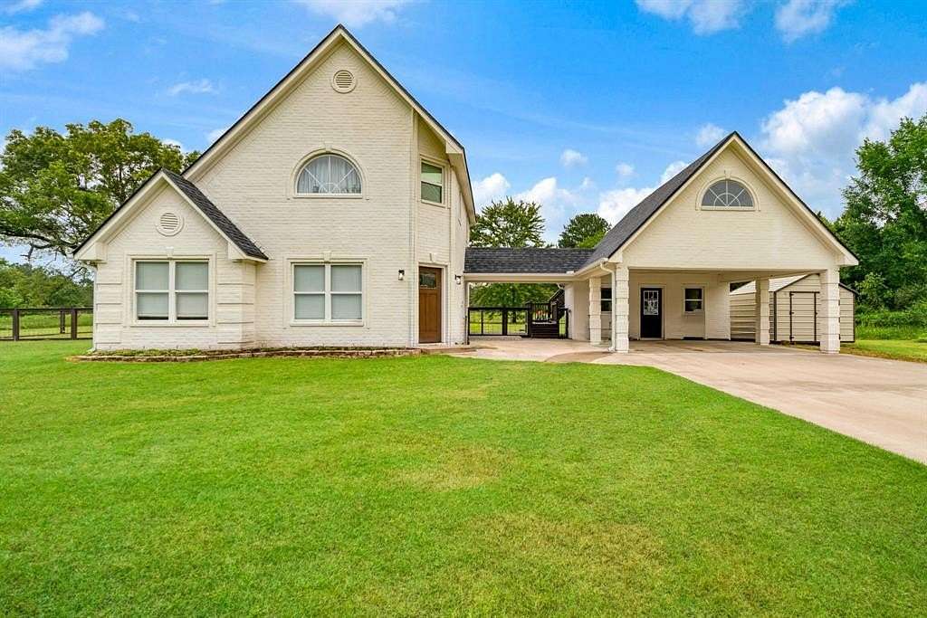 3.28 Acres of Land with Home for Sale in Powderly, Texas