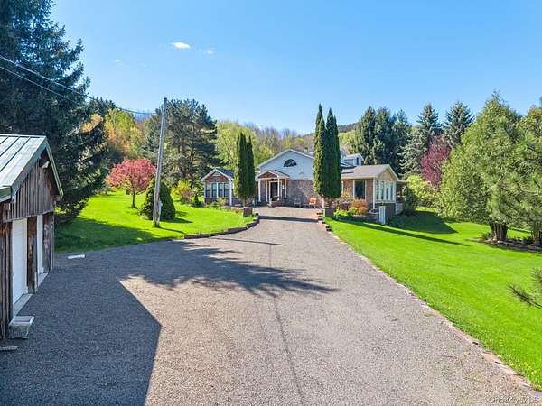 6.37 Acres of Land with Home for Sale in Summit Town, New York