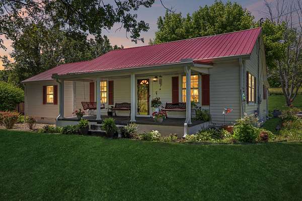 5 Acres of Land with Home for Sale in Santa Fe, Tennessee