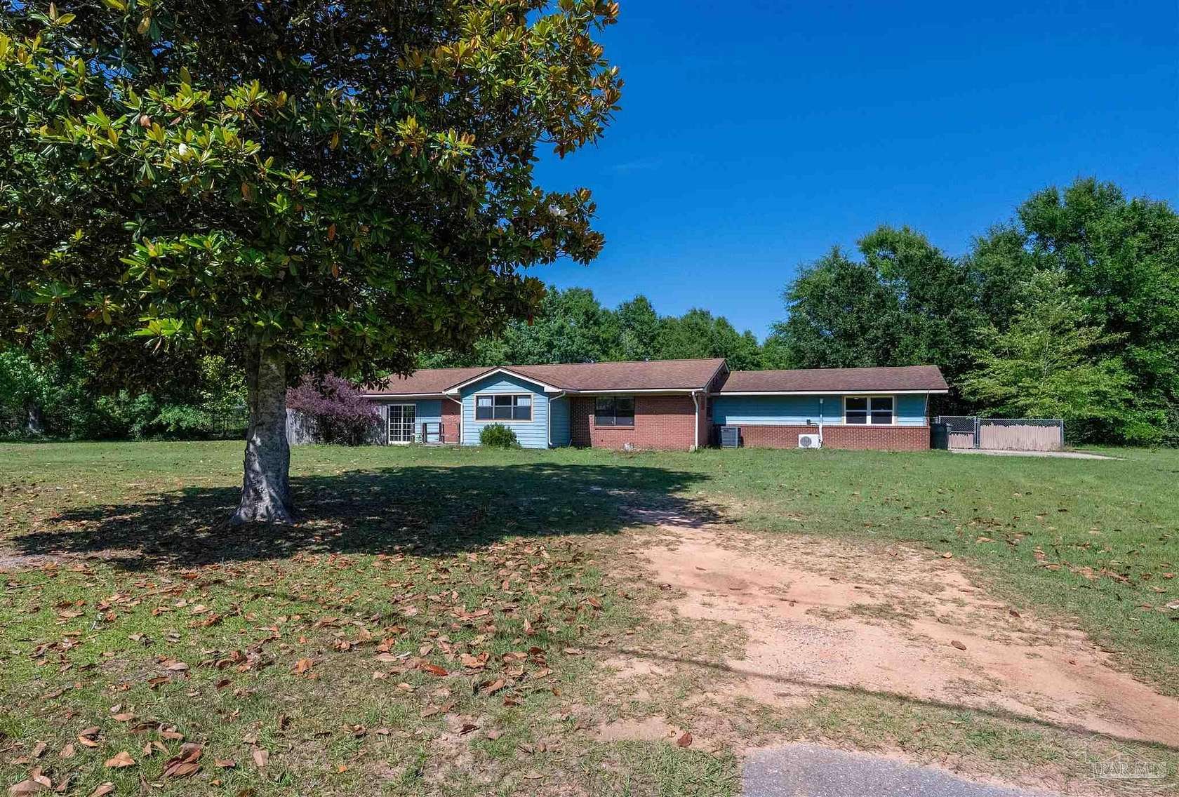 1.77 Acres of Land with Home for Sale in Cantonment, Florida