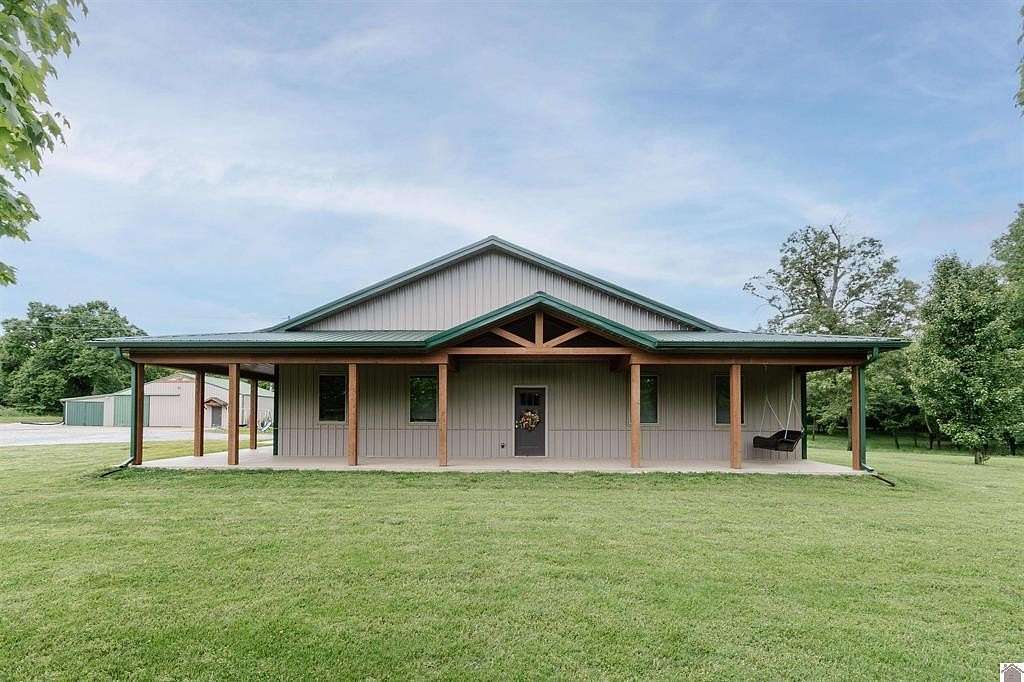 13.9 Acres of Land with Home for Sale in Mayfield, Kentucky