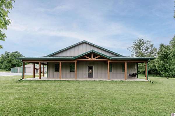 13.9 Acres of Land with Home for Sale in Mayfield, Kentucky