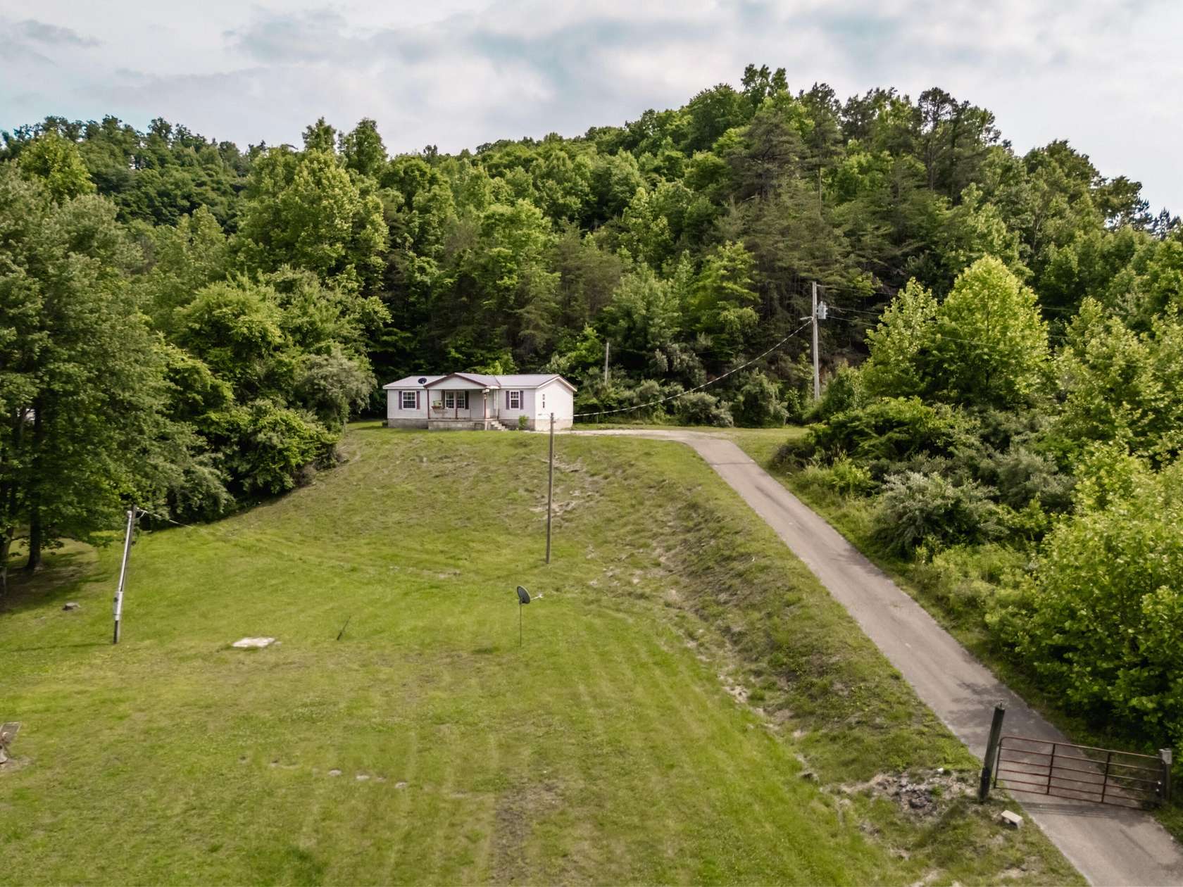 3.3 Acres of Land with Home for Sale in Gray, Kentucky