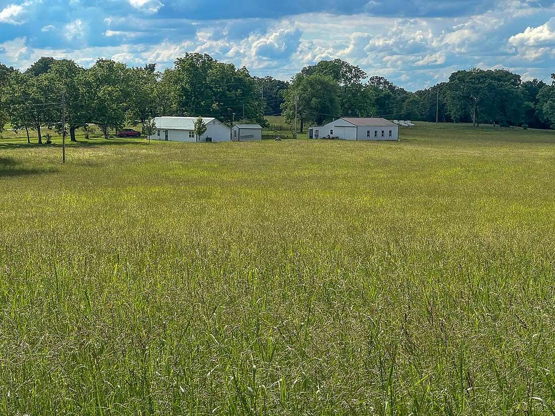 23.7 Acres of Land with Home for Sale in Peel, Arkansas