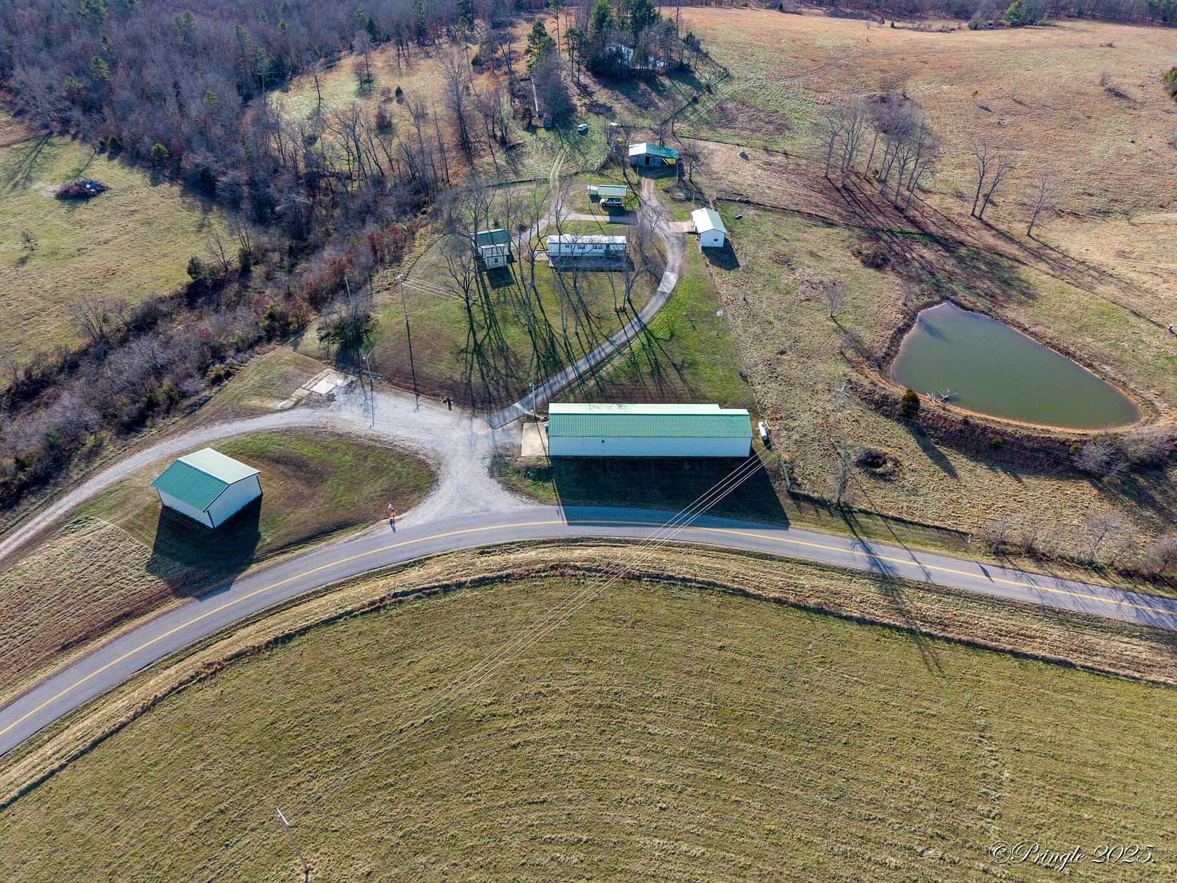 64 Acres of Agricultural Land with Home for Sale in Birch Tree, Missouri