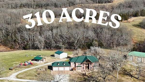 310 Acres of Land with Home for Sale in Reeds Spring, Missouri